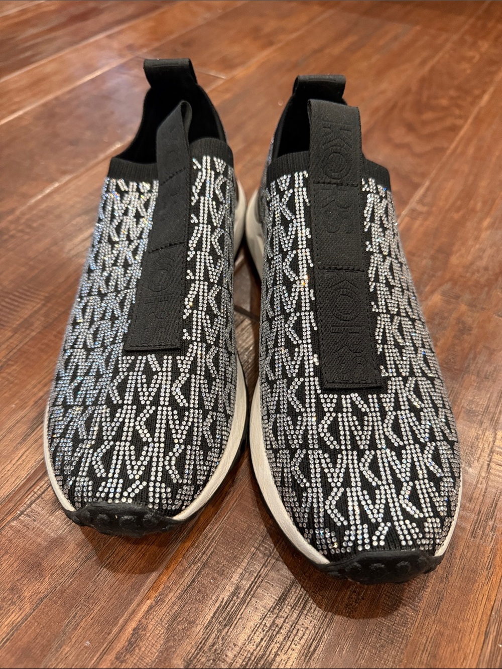 Michael Kors Black and White Slip-On Logo Knit Sneakers